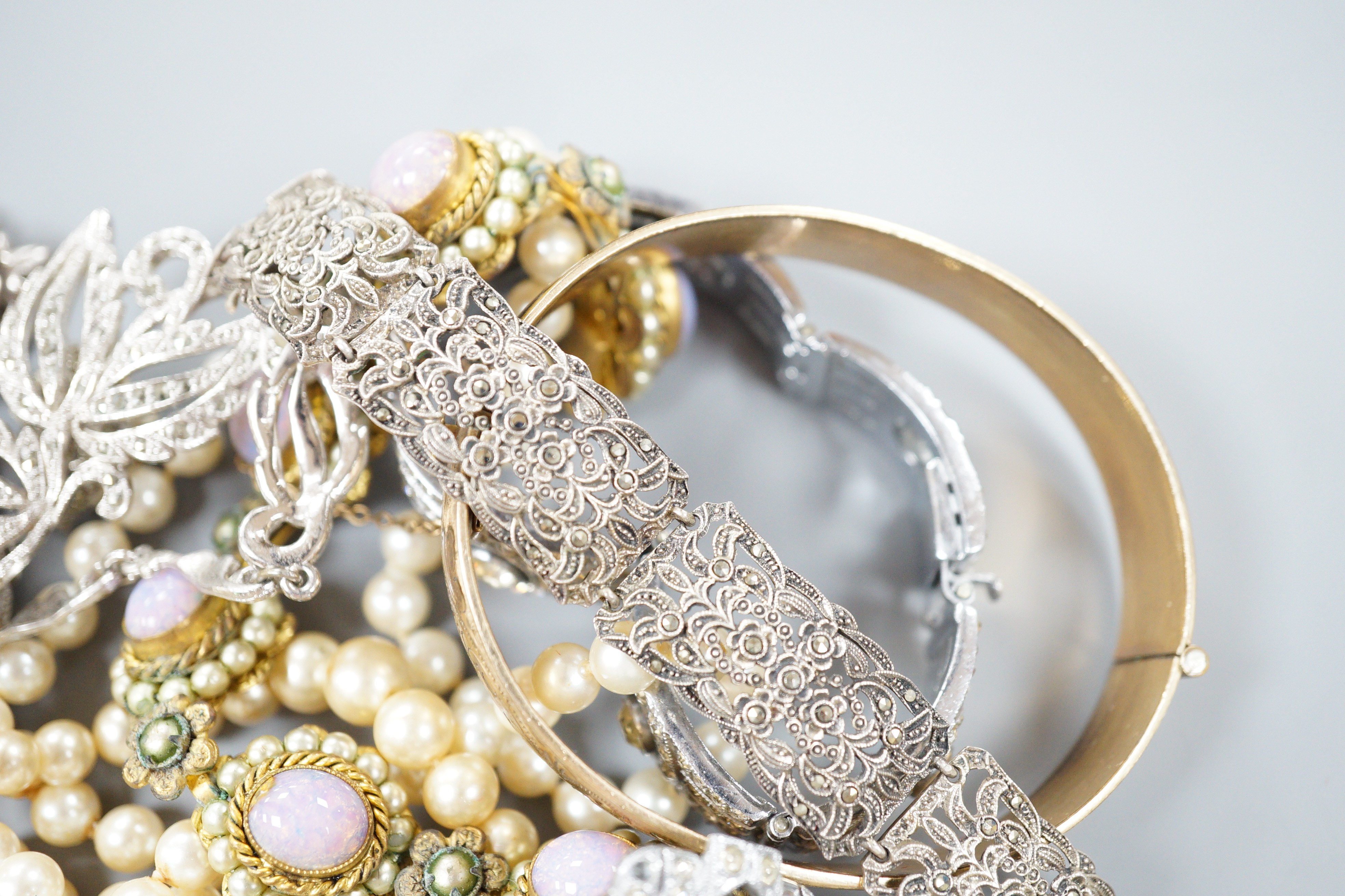 A quantity of assorted costume jewellery, including marcasite and three gentleman's wrist watches including a 9ct Record.